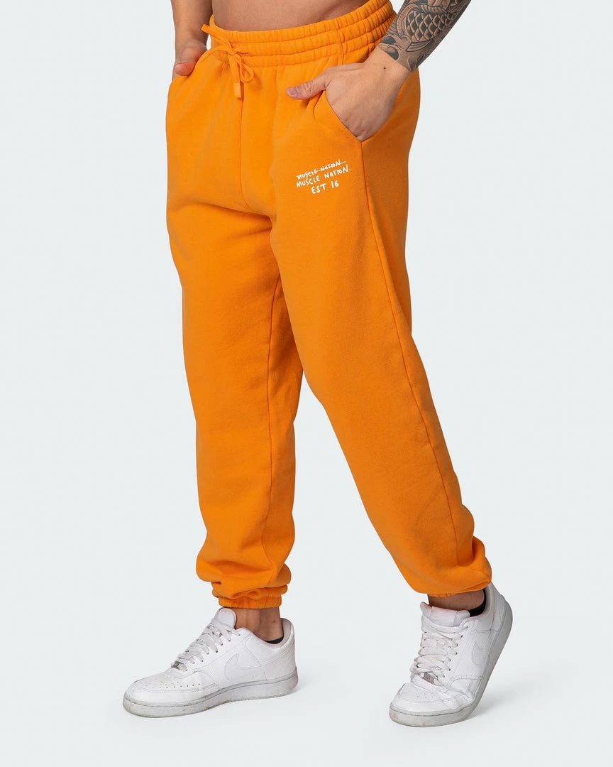 Muscle Nation Mens MN Club Vintage Trackies - Washed Fireball Welcome To The Club 3 Muscle Nation Mens MN Club Vintage Trackies - Washed Fireball Welcome To The Club