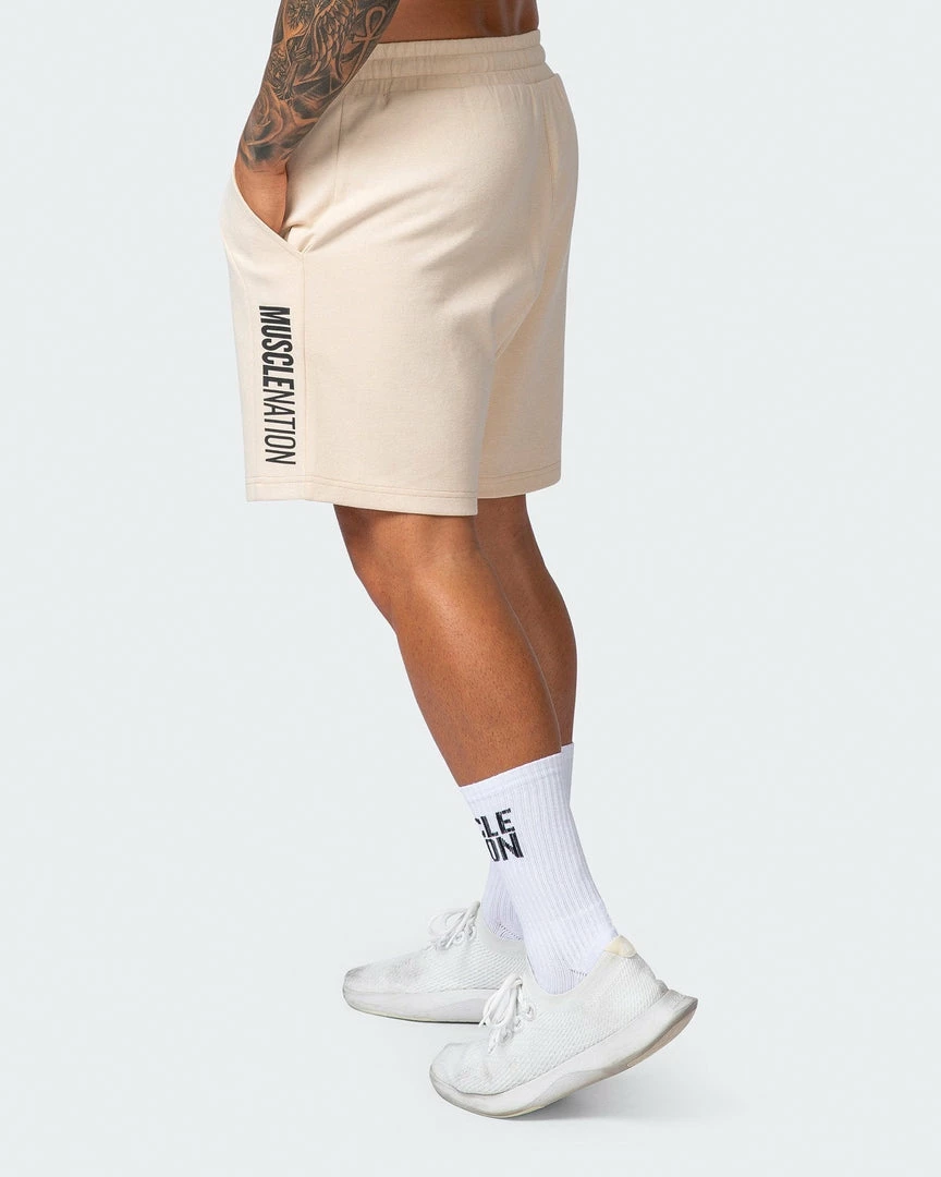 Muscle Nation Laid Back Shorts - Buff 7 Muscle Nation Laid Back Shorts - Buff