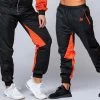 Muscle Nation Unisex Retro Tracksuit Pants - Black / Blood Orange Womens 2 Muscle Nation Unisex Retro Tracksuit Pants - Black / Blood Orange Womens